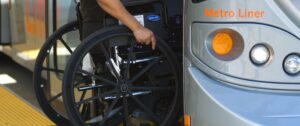 Image of rider in wheelchair boarding Metro bus