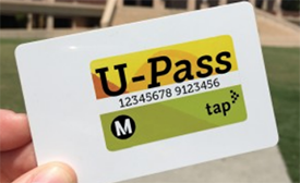 Customer holding a U-Pass card