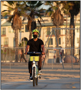 Patron riding Metro Bike.