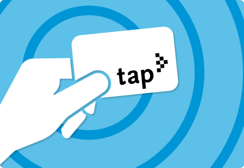 Hand holding TAP card on light blue striped background.