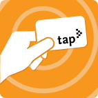 Hand holding TAP card on light orange striped background.